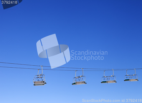 Image of Ski-lift and blue clear sky