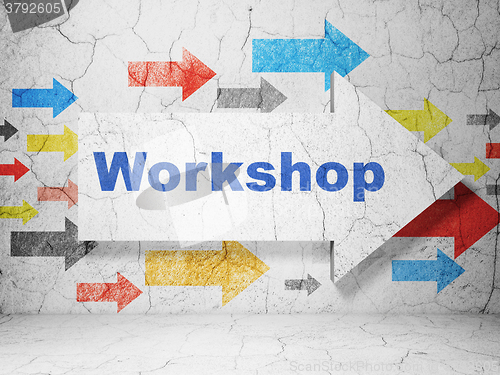 Image of Learning concept: arrow with Workshop on grunge wall background