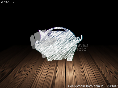 Image of Currency concept: Money Box in grunge dark room