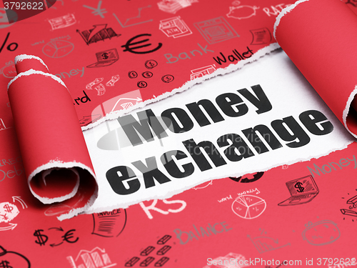 Image of Currency concept: black text Money Exchange under the piece of  torn paper