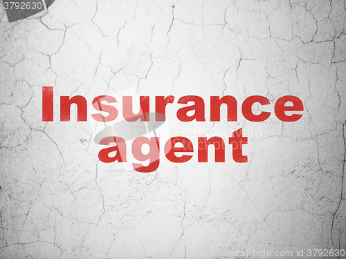 Image of Insurance concept: Insurance Agent on wall background