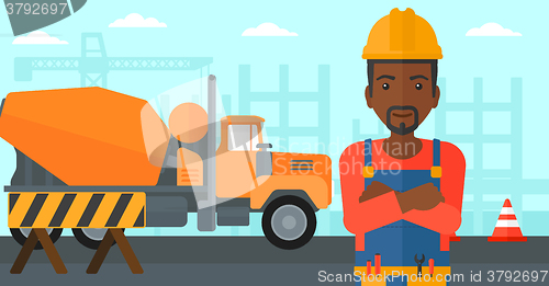 Image of Friendly builder with arms crossed.