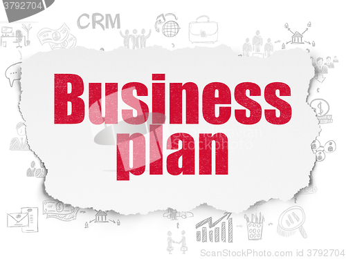 Image of Business concept: Business Plan on Torn Paper background