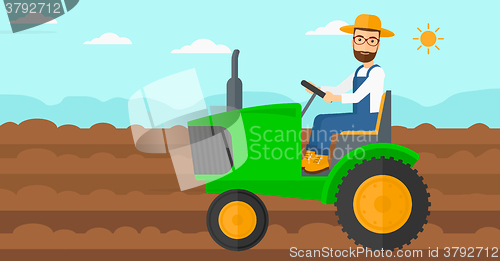 Image of Farmer driving tractor.