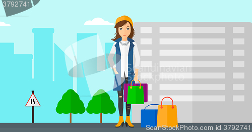 Image of Buyer with shopping bags.