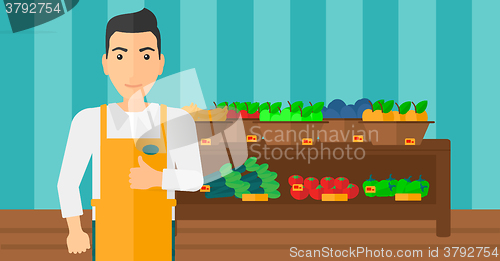 Image of Friendly supermarket worker.