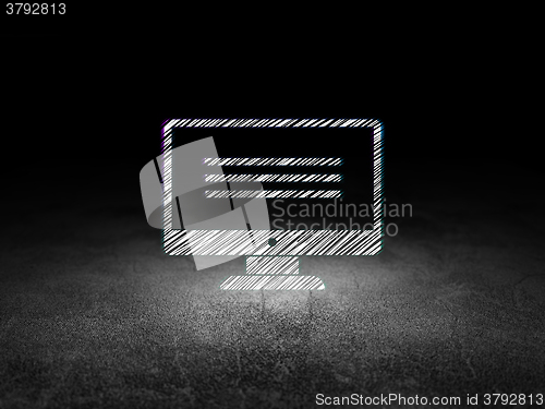 Image of Web development concept: Monitor in grunge dark room