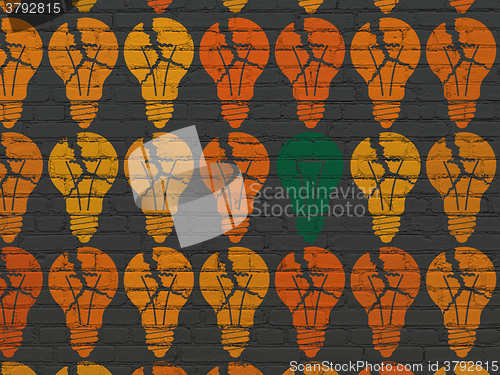 Image of Business concept: light bulb icon on wall background