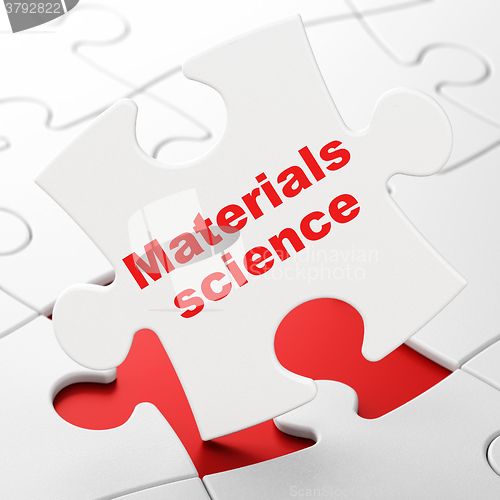 Image of Science concept: Materials Science on puzzle background