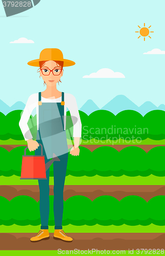 Image of Farmer with watering can.