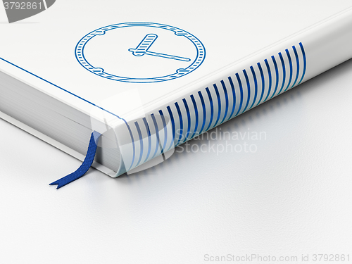 Image of Time concept: closed book, Clock on white background