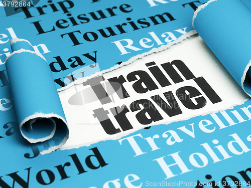 Image of Vacation concept: black text Train Travel under the piece of  torn paper