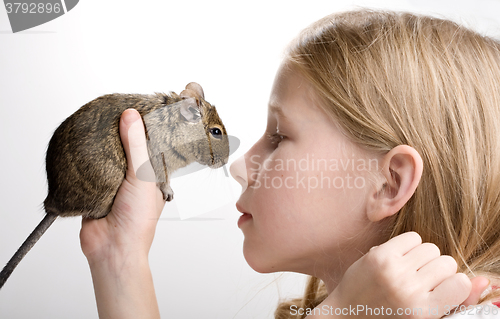 Image of girl with hamster