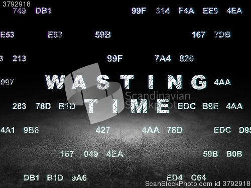 Image of Time concept: Wasting Time in grunge dark room