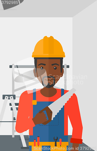 Image of Smiling worker with saw.