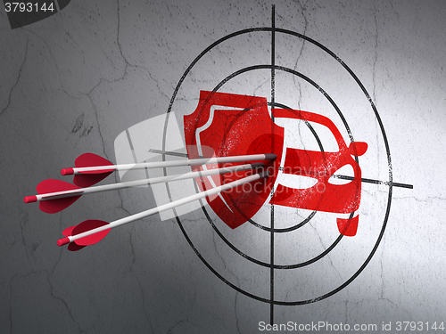 Image of Insurance concept: arrows in Car And Shield target on wall background