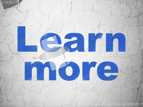 Image of Education concept: Learn More on wall background
