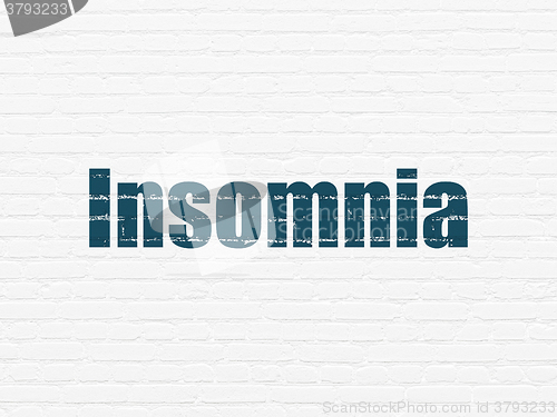 Image of Health concept: Insomnia on wall background