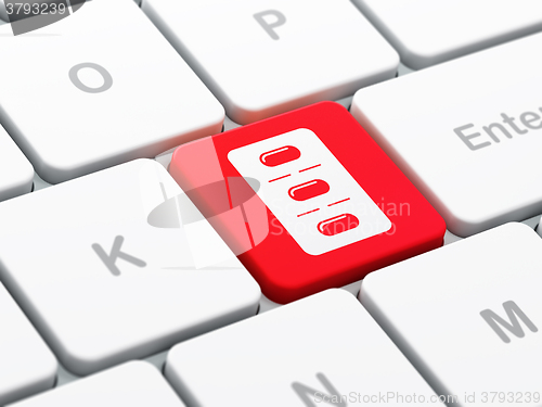Image of Healthcare concept: Pills Blister on computer keyboard background