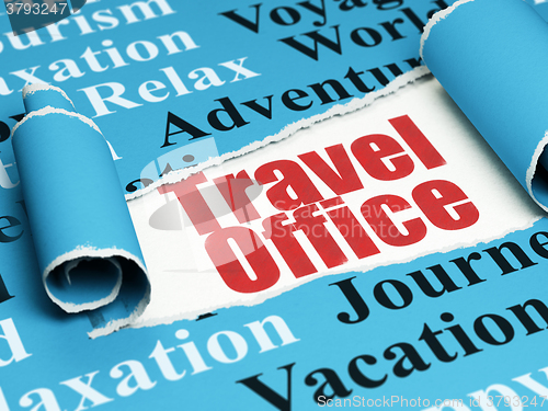 Image of Travel concept: red text Travel Office under the piece of  torn paper