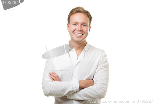 Image of Smiling Man with Folded Arms