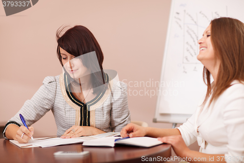 Image of Two female coworkers in a meeting