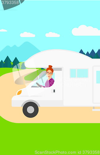 Image of Woman driving motor home.