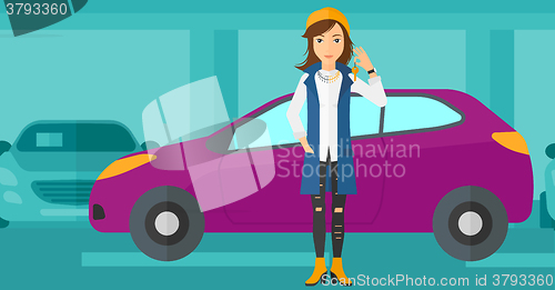 Image of Woman holding keys from new car.
