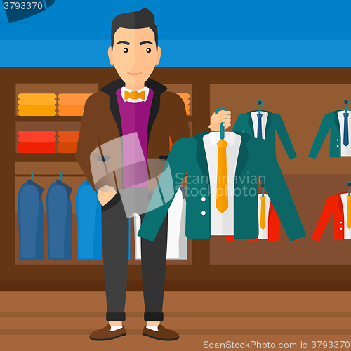 Image of Man holding jacket.