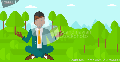 Image of Businessman meditating in lotus pose.