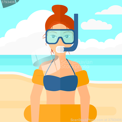 Image of Woman with swimming equipment.