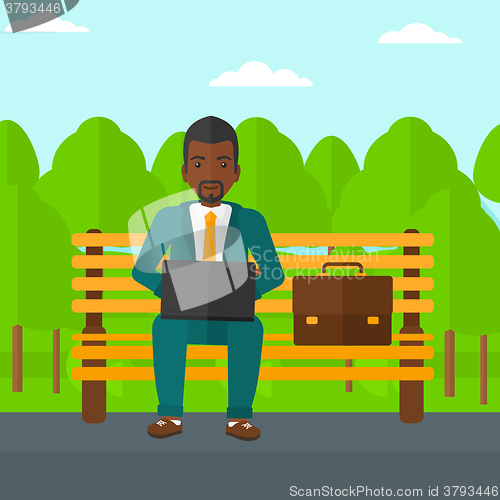 Image of Man working on laptop.