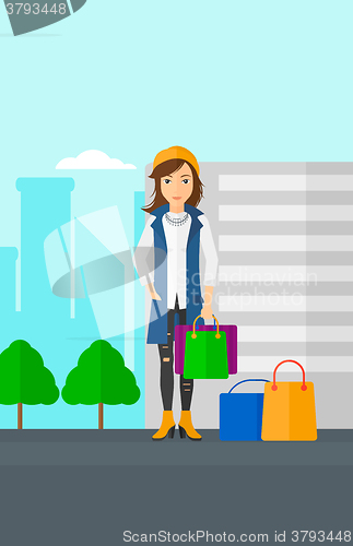 Image of Buyer with shopping bags.