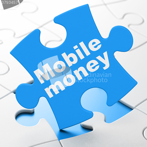 Image of Money concept: Mobile Money on puzzle background