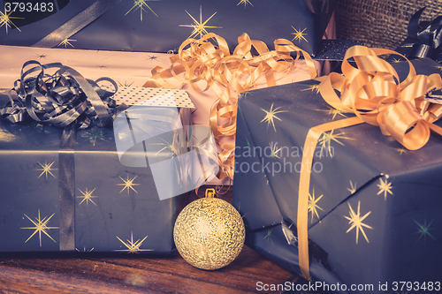 Image of Presents with ribbons and a bauble