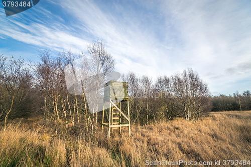 Image of Autumn nature with a hunting tower