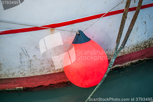 Image of Orange buoy on a fishing boat