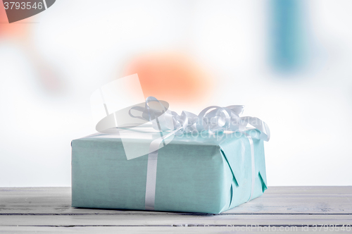 Image of Blue present on a wooden table