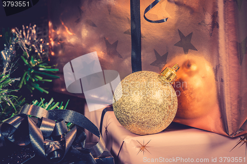 Image of Golden Xmas bauble and a present