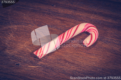 Image of Sugar cane on a wooden background