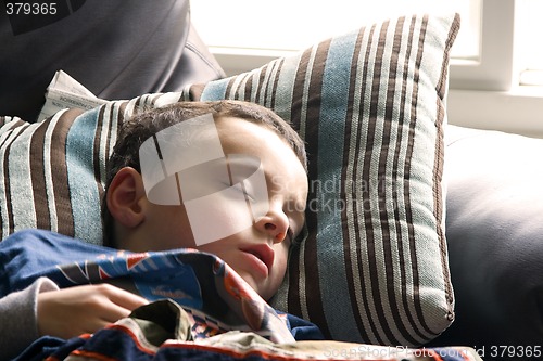 Image of Cute Little Boy Sleeping on the Couch