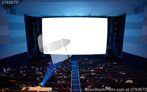 Image of Cinema auditorium with light of projector.