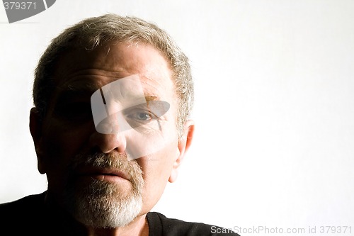 Image of Close up on the face of a baby boomer - Isolated