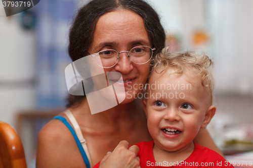 Image of Forty years old mother with her son