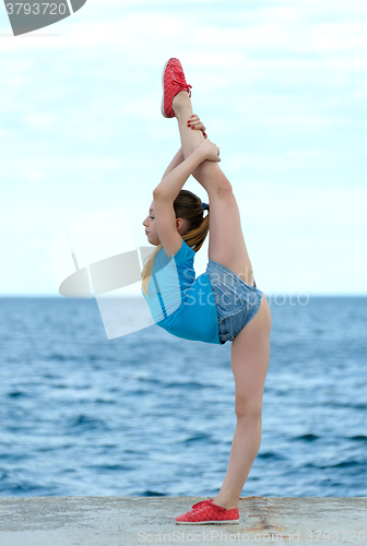 Image of Girl stretching out outdoor