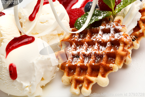 Image of Restaurant dessert with waffles and ice-cream