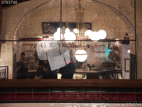 Image of Cafe Interior Reflecting in the Mirror