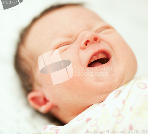 Image of Portrait of crying newborn baby