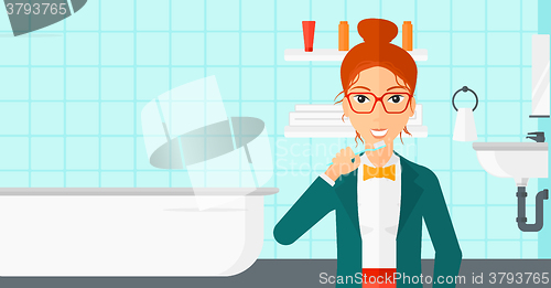 Image of Woman brushing teeth.