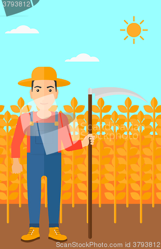 Image of Farmer on the field with scythe.